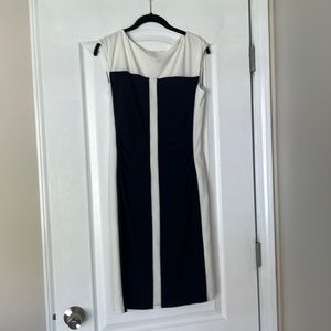Excellent condition—navy blue and white